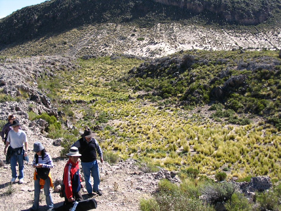 tourists visit circular atlantis canal at Pampa Aullagas